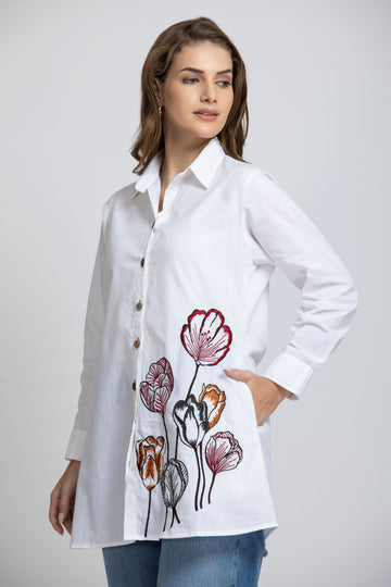 SOLID COLOR FRONT EMBROIDERED BUTTON-UP SHIRT.