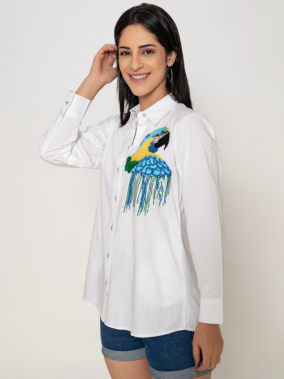 WHITE FRONT EMBROIDERED MACAW COTTON  SHIRT WITH HANGING SEQUENCE DETAILING